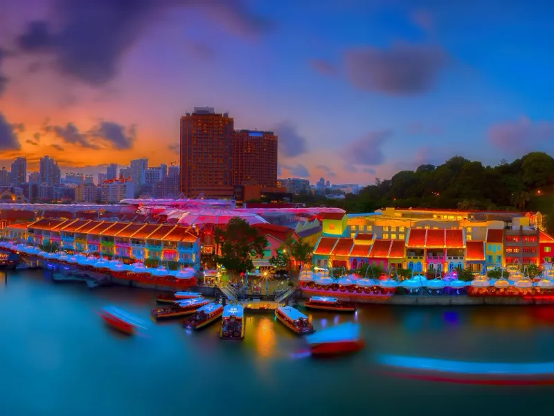 Singapore's colourful Clarke Quay waterfront at sunset